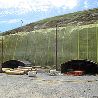 Comprehensive protection of a mountain wall with Minegrid to prevent erosion and rockfall